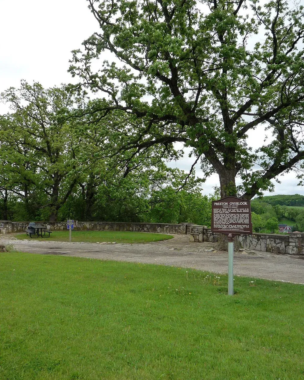 The Preston Overlook, a stone-walled scenic overlook above the Root River valley, with bluff country visible in the distance near Preston, Minnesota.